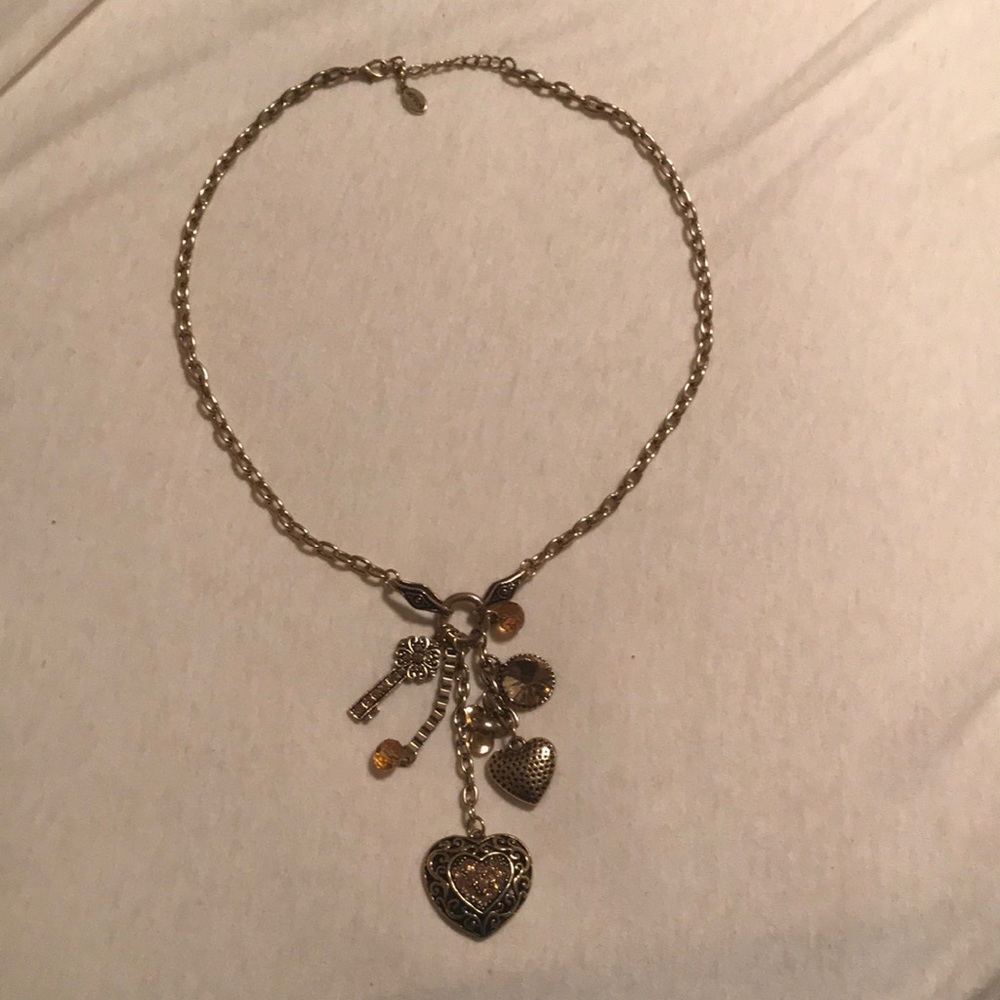 Necklace with 7 attached charms  hearts, key etc